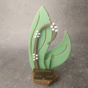 Le Muguet en chocolat porte...